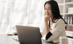 A person looking at a computer.