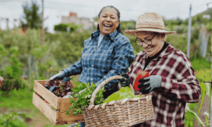 Two people holding baskets